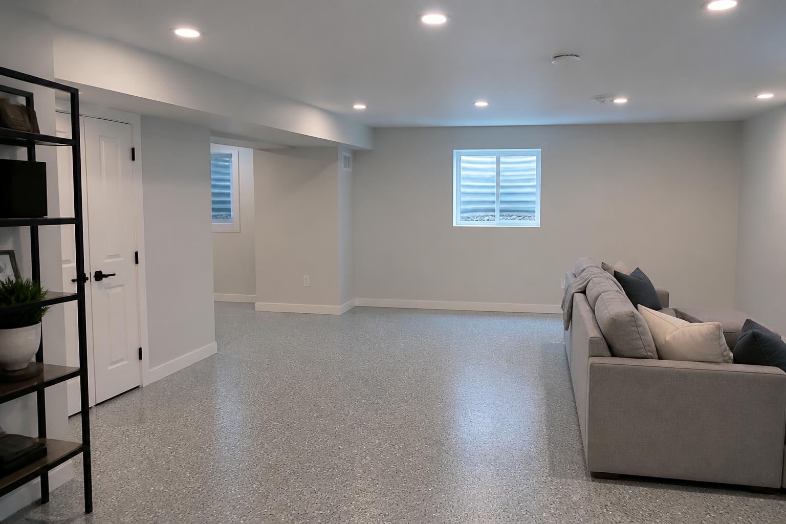 Representative example of a finished basement floor with a full-flake concrete coating