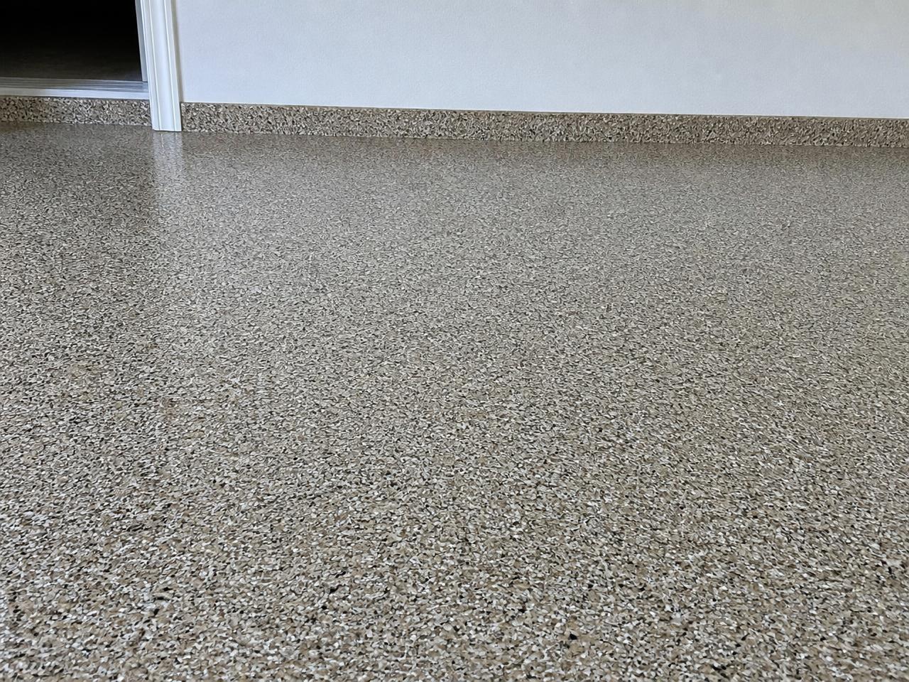 Representative example of a flake blend close-up with a full-flake concrete coating